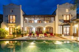 Casa Orquidea: Timeless 6-Bedroom Spanish Colonial in Exclusive Hacienda Pinilla