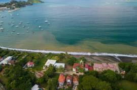 Surfside Lot Y22: One of the Only Remaining BEACHFRONT Lots in Playa Potrero with Water!!