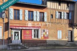 Immeuble avec local commercial loué