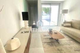 Spectacular 2 Bedroom Apartment within Walking Distance to the Ria Formosa and Waterfront of Cabanas.  Amazing Pool and Garage