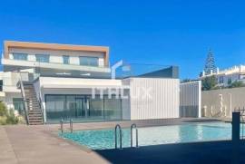 Spectacular 2 Bedroom Apartment within Walking Distance to the Ria Formosa and Waterfront of Cabanas.  Amazing Pool and Garage