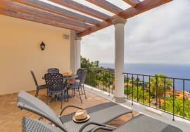 Elegant Two-Bedroom Top-Floor Apartment in Palheiro Village with Panoramic Ocean Views