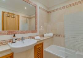 Elegant Two-Bedroom Top-Floor Apartment in Palheiro Village with Panoramic Ocean Views