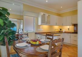 Elegant Two-Bedroom Top-Floor Apartment in Palheiro Village with Panoramic Ocean Views