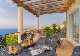 Elegant Two-Bedroom Top-Floor Apartment in Palheiro Village with Panoramic Ocean Views