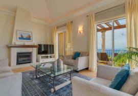 Elegant Two-Bedroom Top-Floor Apartment in Palheiro Village with Panoramic Ocean Views