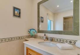 Elegant Two-Bedroom Top-Floor Apartment in Palheiro Village with Panoramic Ocean Views