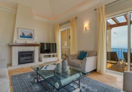 Elegant Two-Bedroom Top-Floor Apartment in Palheiro Village with Panoramic Ocean Views