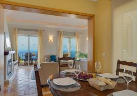 Elegant Two-Bedroom Top-Floor Apartment in Palheiro Village with Panoramic Ocean Views