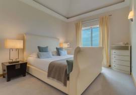 Elegant Two-Bedroom Top-Floor Apartment in Palheiro Village with Panoramic Ocean Views