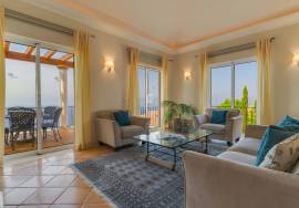 Elegant Two-Bedroom Top-Floor Apartment in Palheiro Village with Panoramic Ocean Views