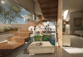 Excellent plot of land near the beach with approved project for a modern 4-bedroom villa between Almancil and Quinta do Lago.