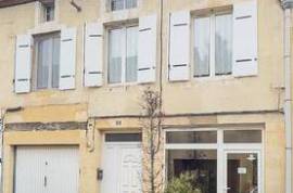 Appartement de 83 m² avec surface commerciale vitrée
