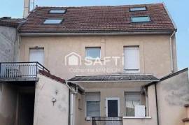 A vendre à Reims un appartement loué et une place de parking