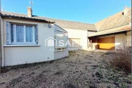 Plain pied en cœur de village avec écoles et commerces à pied