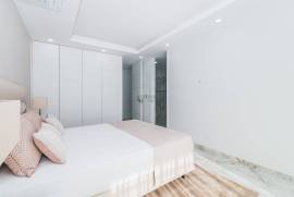 New 2-Bedroom Apartment with Sea View, Garage, and Communal Pool in Ameijeira, Lagos
