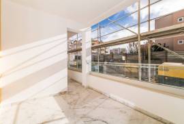 New 2-Bedroom Apartment with Sea View, Garage, and Communal Pool in Ameijeira, Lagos