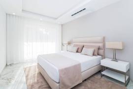 New 2-Bedroom Apartment with Sea View, Garage, and Communal Pool in Ameijeira, Lagos