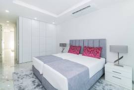New 2-Bedroom Apartment with Sea View, Garage, and Communal Pool in Ameijeira, Lagos