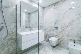 New 2-Bedroom Apartment with Sea View, Garage, and Communal Pool in Ameijeira, Lagos