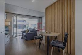 NEW apartment with balcony and 2 parking spaces near the beach