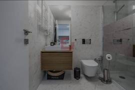 NEW apartment with balcony and 2 parking spaces near the beach