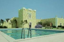 Ancient Masseria Odissea with courtyard, pool and various lounge areas of typical Salento style
