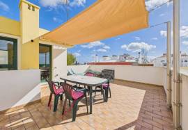 Tavira 2 bed top floor apartment with terraces sold fully furnished