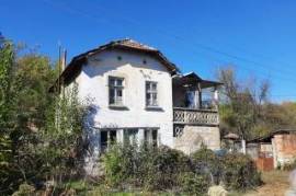 Rural property with house, big barn, spacious yard and quiet location 100 km away from Sofia, Bulgaria