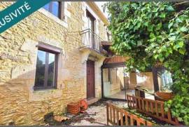 Maison de village en pierre 7 pièces 180 m² avec grand garage et jardin proche tous commerces et commodités