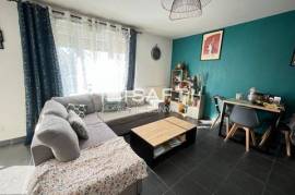 Appartement 3 pièces dans résidence récente proche des commerces +1 emplacement de parking couvert