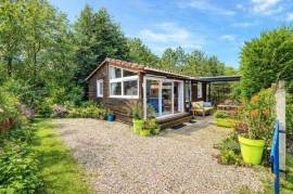 Chalet rénové avec extension possible, terrain privatif