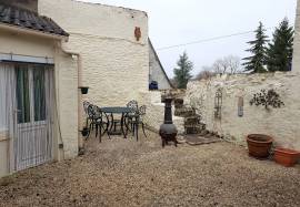 Village house with garage for sale near St. Savin 86