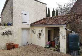 Village house with garage for sale near St. Savin 86