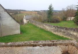 Village house with garage for sale near St. Savin 86
