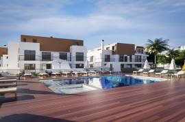 Spectacular 2 Bedroom Apartment within Walking Distance to the Ria Formosa and Waterfront of Cabanas.  Amazing Pool and Garage