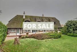 Detached Thatched Cottage with Landscaped Gardens