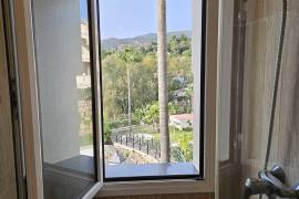 Exquisite 2-Bedroom Apartment with Spectacular Views, Jacuzzi, and communal Pool in Elviria