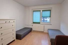 Spacious room with two single beds in Leipzig