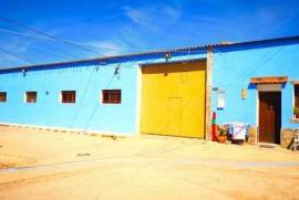 INDUSTRIAL WAREHOUSE + HOUSE IN MONTESINOS