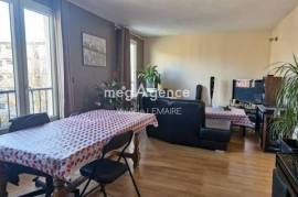 Appartement T3 62m² + cave + 2 places de parking