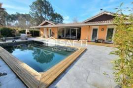 Maison à Marcheprime avec un grand terrain et piscine au calme