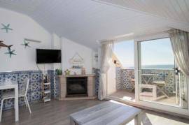 Charming 1-Bedroom Apartment – Frontline Beach in Sesimbra with AL licence and Garage.
