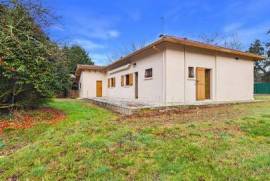 Maison des années 80 à rénover sur terrain constructible de 1191 m²