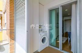 Excellent 1-bedroom apartment with sea views in a condominium with a  pool, south-facing balcony next to Quarteira beach.