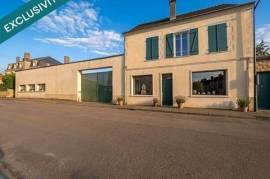 Ensemble immobilier composé de 4 appartements et 300 m² de murs commerciaux LIBRES + jardin