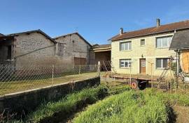 Charming Village Property with Outbuildings and Large Garden - €91395