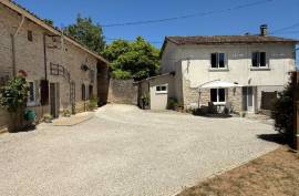 Charming Property with Two Houses, Barn, and Woodland  Near Civray - €249,950