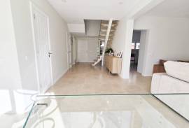 Modern, spacious T5 condominium with two pools & more