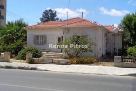 Commercial land with House at Paphos center for sale